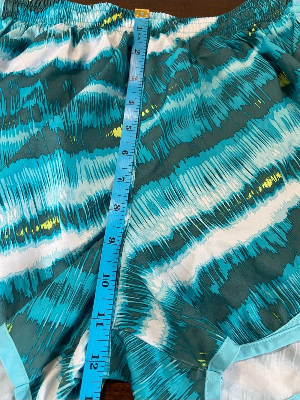 Nike Teal, White and Yellow Patterned Women’s Athletic Shorts. Size M